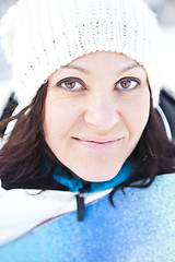 Image showing Winter woman with snowboard