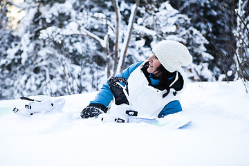 Image showing Winter woman with snowboard