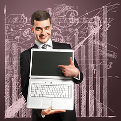 Image showing Businessman With Open Laptop In His Hands