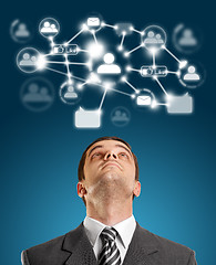 Image showing Businessman Looking Upwards in Social Network