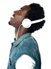 Image showing A handsome young boy with headphones