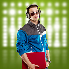 Image showing Man With Headphones And Laptop