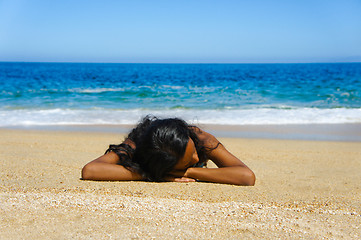 Image showing Lying on the beach