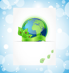 Image showing Green earth with leaves wrapped ribbon