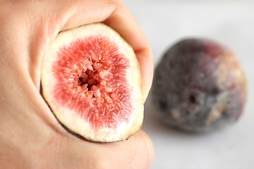 Image showing fig fruits hand