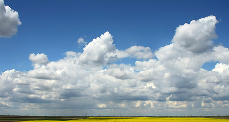 Image showing Spring clouds over land