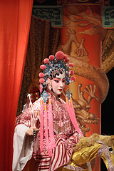 Image showing chinese opera dummy and red cloth as text space ,it is a toy,not