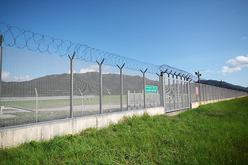 Image showing palisade on green yellow meadow 