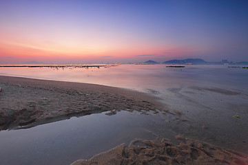 Image showing Tropical sunset on the beach.