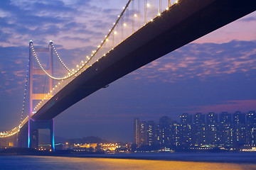 Image showing long bridge in sunset hour