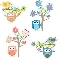 Image showing Blooming tree and branches with sitting owls and birds