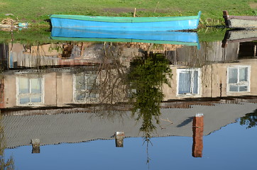 Image showing boats river coast and reflections on water 