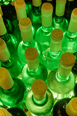 Image showing wine bottles stacked up