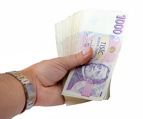 Image showing czech banknotes nominal value one thousand crowns in hand