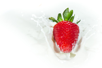 Image showing strawberry splashing into milk