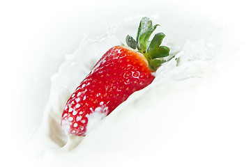 Image showing strawberry splashing into milk