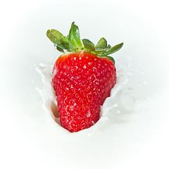 Image showing strawberry splashing into milk