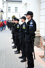 Image showing Row of police officers