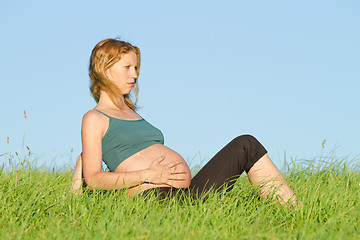 Image showing pregnant woman on meadow