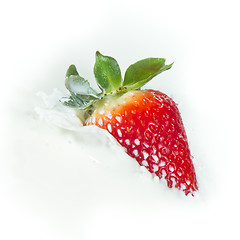 Image showing strawberry splashing into milk