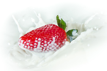 Image showing strawberry splashing into milk