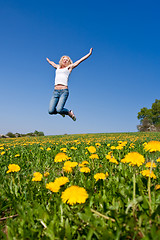 Image showing happy young woman on meadow