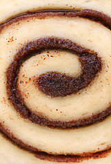 Image showing Macro of cinnamon bun swirl with selective focus on center.