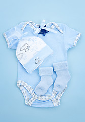 Image showing Blue baby clothes for infant boy