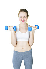 Image showing Happy active girl holding weights