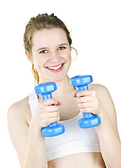 Image showing Fit active girl exercising with weights