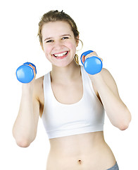 Image showing Fit active girl exercising with weights