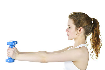 Image showing Fit active girl lifting weights for fitness