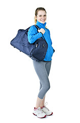 Image showing Athletic girl with gym bag ready for workout