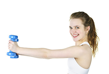 Image showing Fit active girl lifting weights for fitness