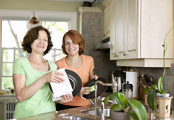 Image showing Women doing dishes in kitchen