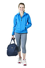 Image showing Athletic girl with gym bag ready for workout