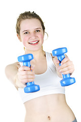 Image showing Fit active girl exercising with weights