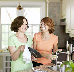 Image showing Women doing dishes in kitchen