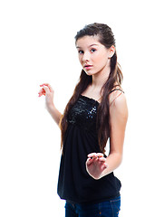 Image showing beautiful  teenager girl with long dark hair on isolated white