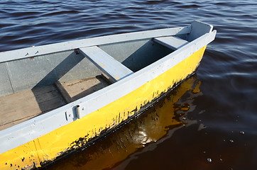 Image showing wooden scull rowboat ripple water. water transport 