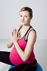 Image showing Pregnant woman meditating