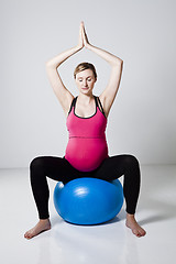 Image showing Pregnant woman meditating