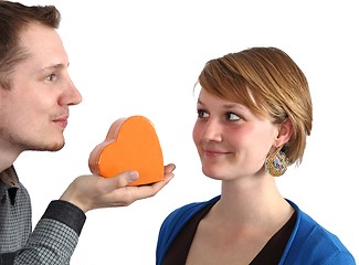 Image showing Man givs a heart to a women