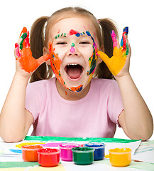 Image showing Cheerful girl with painted hands