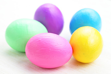 Image showing children paint colorful easter eggs