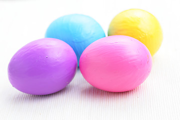 Image showing children paint colorful easter eggs