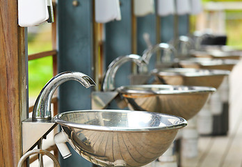 Image showing sinks and taps outdoor