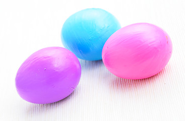 Image showing children paint colorful easter egg