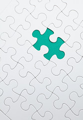 Image showing puzzle with green piece missed