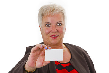 Image showing Female senior with business card